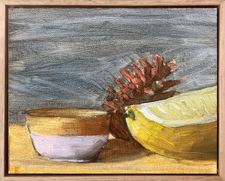 Wooden bowl, pinecone, lemon