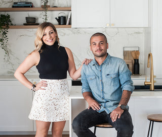 An image of a female and male, looking very happy after using our trade services for interior designers, architects, and trade professionals.