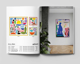A photo of one of our art catalogues showcasing Australian artwork.