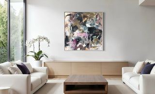 This image shows a modern living room with an abstract painting on the wall. With our artwork hire, you can also showcase beautiful artwork for your special events.